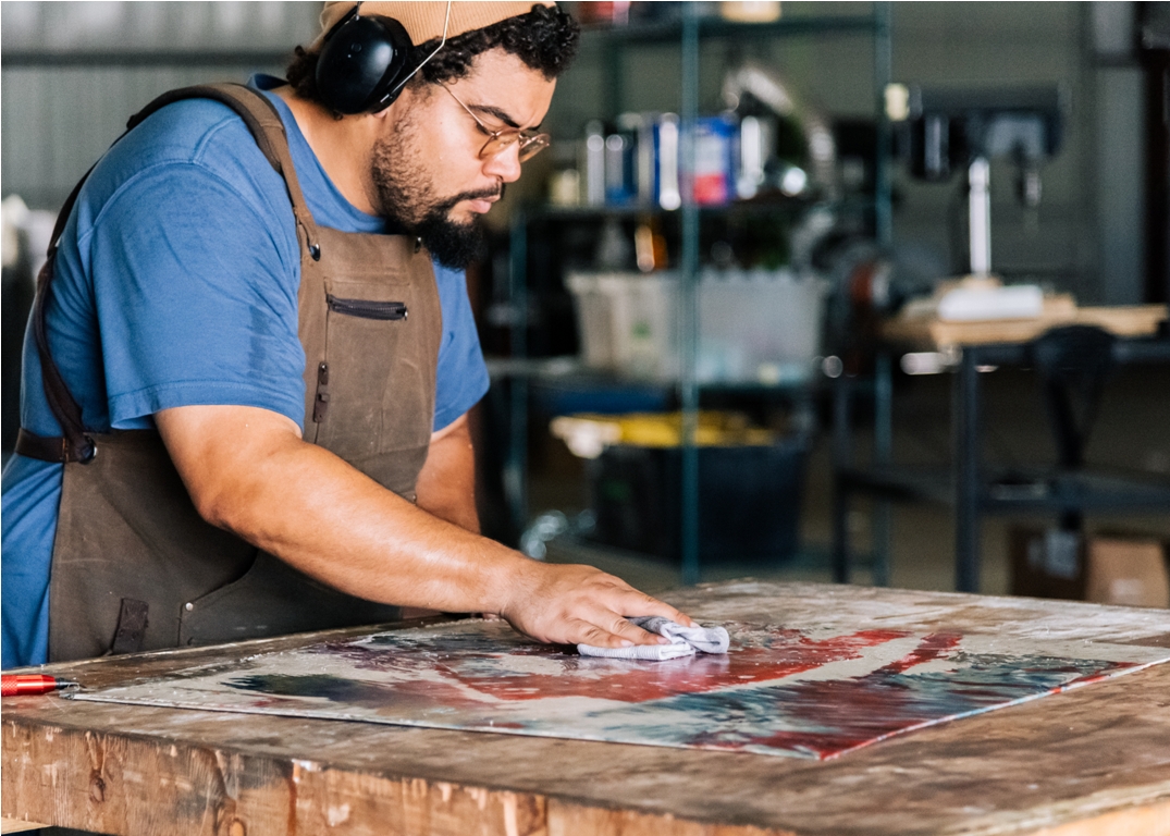 an artist wipes clean his artwork made from recycl 2022 11 09 16 46 46 utc