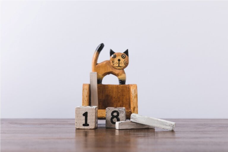 close up view of decorative wooden calendar on tabletop