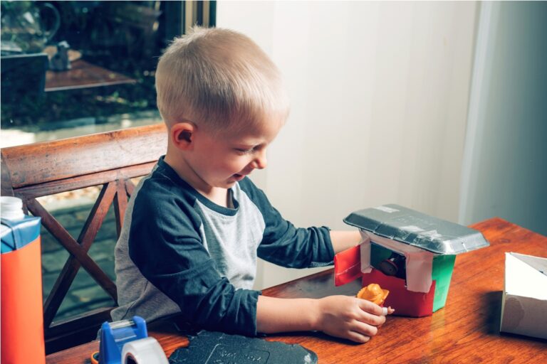 little boy making crafts from different recycled m 2021 08 28 23 07 37 utc