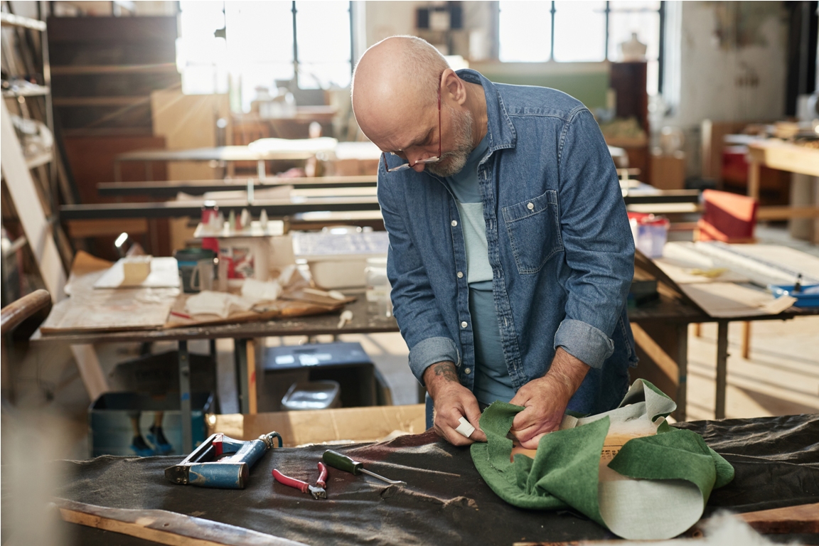 senior craftsman refurbishing furniture in worksho 2023 09 07 22 30 05 utc