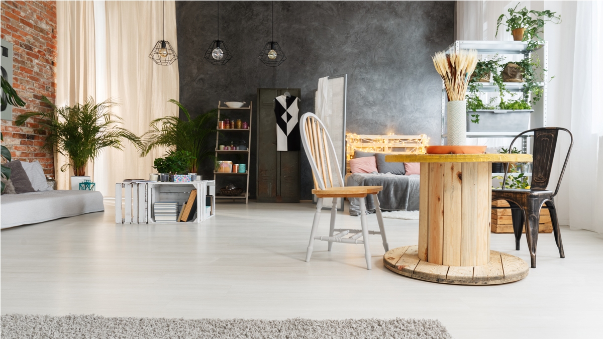 modern upcycled interior of spacious grey and white loft