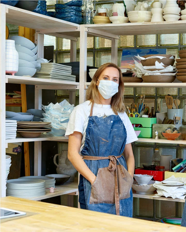 waist up portrait of cheerful female artisan with 2021 08 29 03 41 45 utc