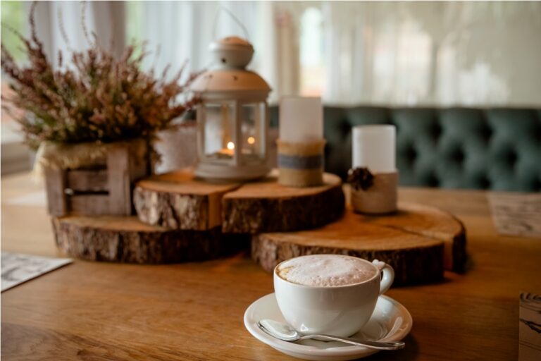 a cup of coffee cappuccino and autumn decor on ta 2023 11 27 05 04 55 utc